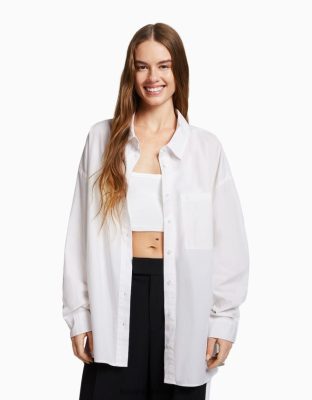 Bershka ženy oversize popelínová košeľa s dlhým rukávom biela oblečenie B86RXX927 Bershka Nohavice
