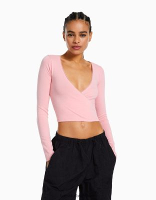 Bershka ženy prekrížené tričko s dlhým rukávom ružová oblečenie B86RXX572 Bershka Rifle