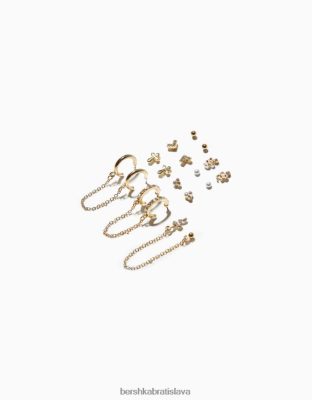 Bershka ženy sada 9 náušníc hada a krížika so zlatým efektom zlato príslušenstvo B86RXX2478 Bershka Nohavice