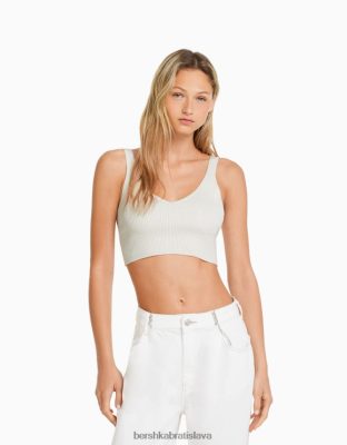 Bershka ženy top z rebrovaného úpletu s výstrihom do V krém oblečenie B86RXX776 Bershka Rifle