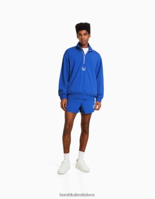 Bershka muži bermudy s nylonovou potlačou modrá oblečenie B86RXX3372 Bershka Nohavice