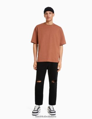 Bershka muži džínsy voľného strihu s roztrhávaním čierna oblečenie B86RXX3206 Bershka Rifle