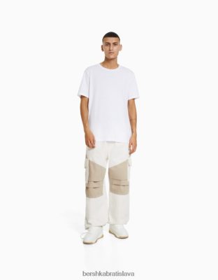 Bershka muži farebné blokové nákladné padákové džínsy krém oblečenie B86RXX3278 Bershka Rifle