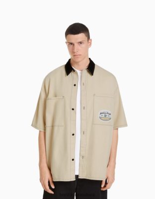 Bershka muži riflová pracovná košeľa s krátkym rukávom krém oblečenie B86RXX2882 Bershka Rifle