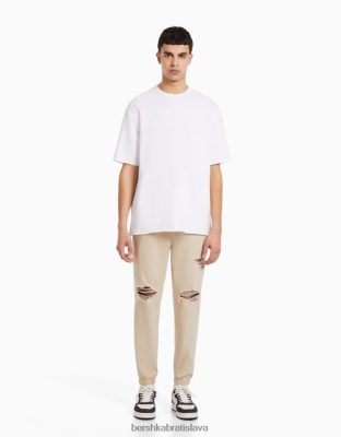 Bershka muži roztrhané farebné jogger džínsy béžová oblečenie B86RXX3193 Bershka Slovakia