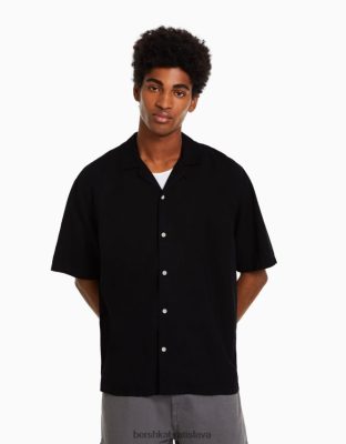 Bershka muži rustikálna košeľa voľného strihu s krátkym rukávom čierna oblečenie B86RXX2945 Bershka Rifle
