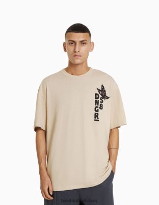 Bershka muži tričko boxy fit s krátkym rukávom s potlačou ťava oblečenie B86RXX2619 Bershka Nohavice
