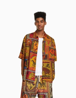 Bershka muži tričko s krátkym rukávom s potlačou oranžová oblečenie B86RXX2859 Bershka Nohavice