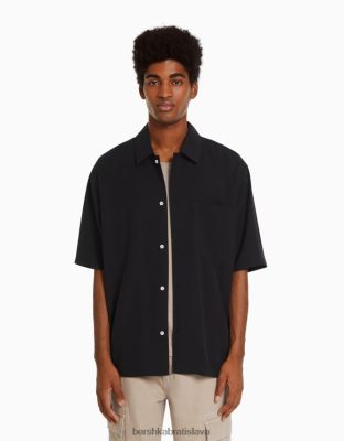 Bershka muži tričko voľného strihu s krátkym rukávom čierna oblečenie B86RXX2903 Bershka Rifle