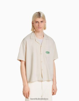 Bershka muži vyšívaná džínsová košeľa s krátkym rukávom off white oblečenie B86RXX2873 Bershka Rifle