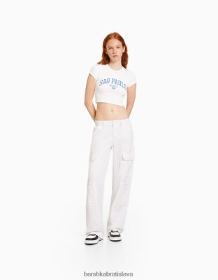 Bershka unisex bavlnené cargo nohavice s nízkym pásom a kontrastnou niťou off white oblečenie B86RXX3902 Bershka Rifle